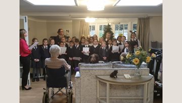 Carol singing at Adelaide House